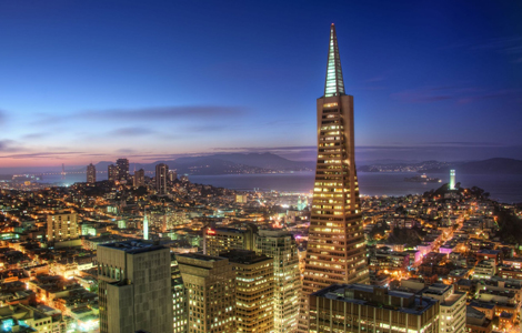 The Deluxe Evening Tour offers views of a glowing San Francisco